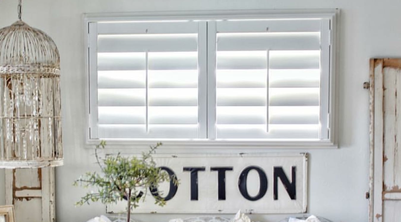 Plantation shutters in an airy room